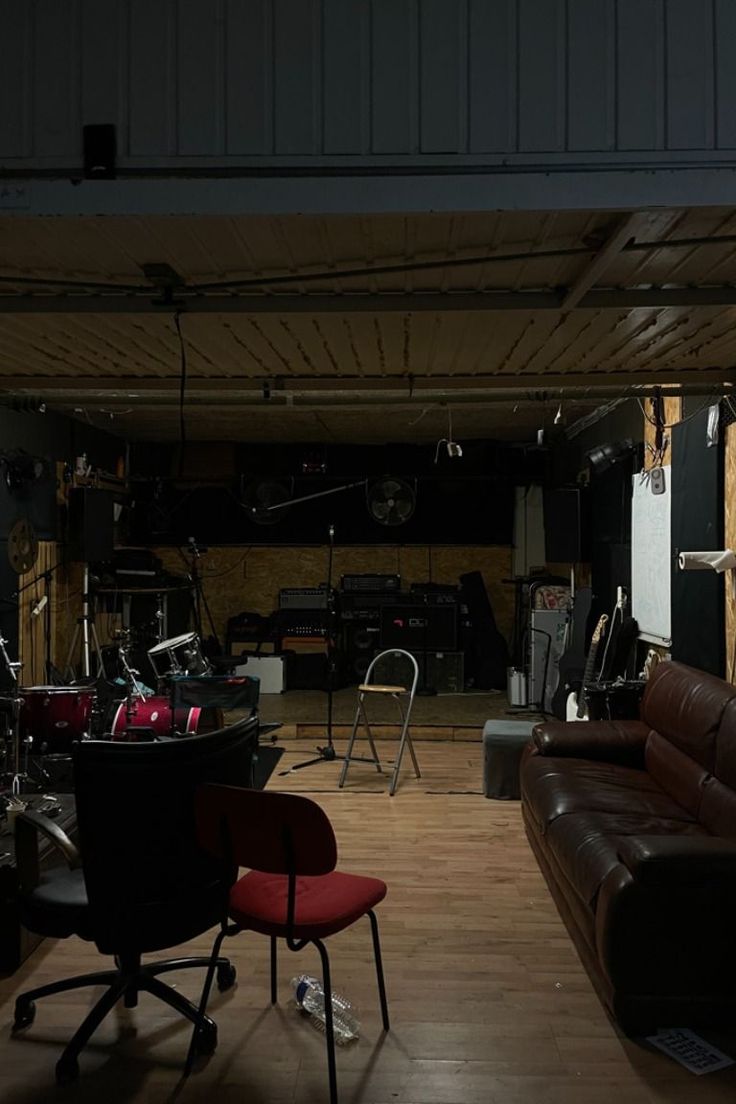 a living room filled with furniture and lots of clutter