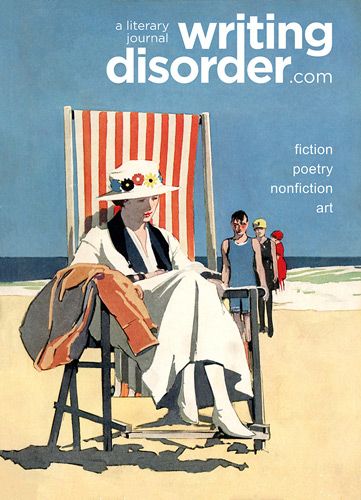 a woman sitting in a chair on the beach