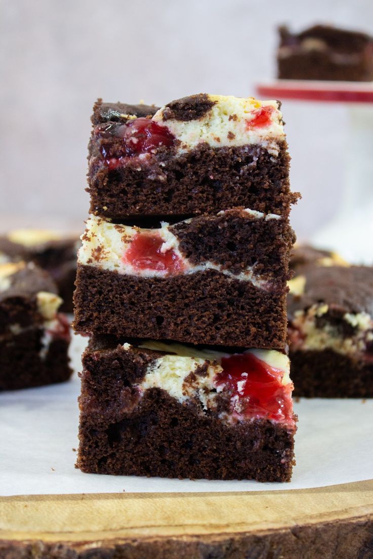 four pieces of cake sitting on top of each other