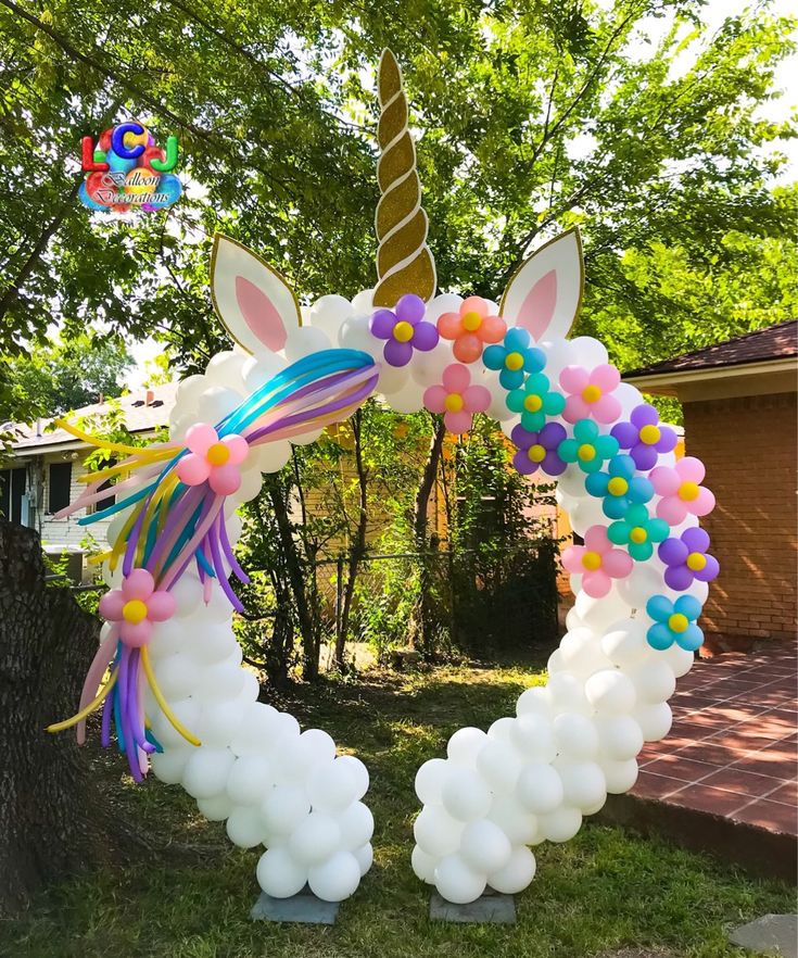 an inflatable unicorn wreath with balloons