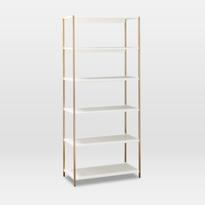 a white shelving unit with four shelves