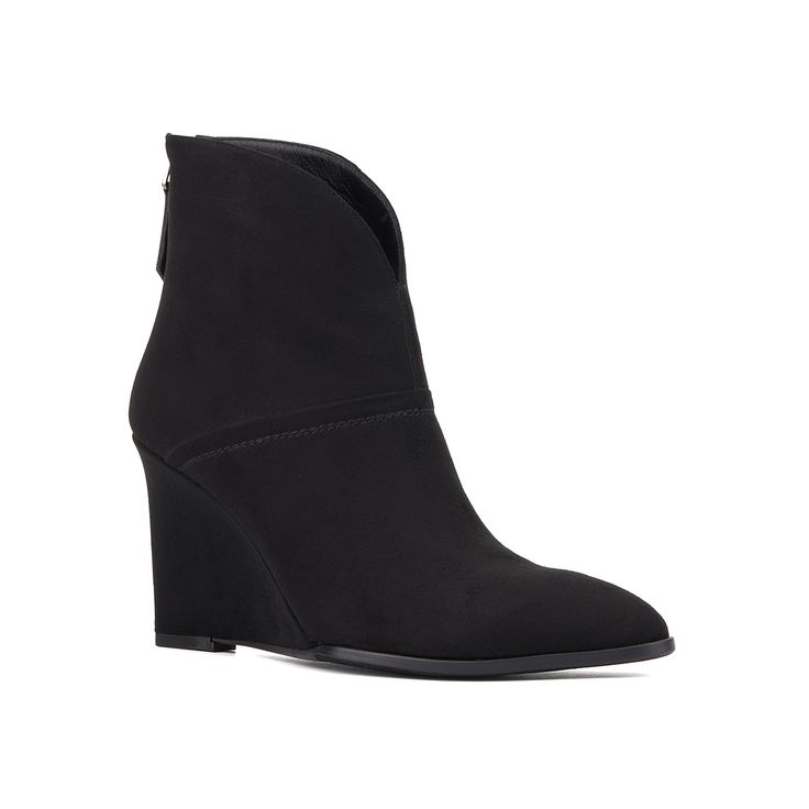 TORGEIS-Lexis Wedge Bootie Bring sleek flair to a layered look with the Torgeis Lexis bootie. This pair sports a handy back zipper for easy on and off, while the wedge heel elevates the ensemble. Click here for Boot Measuring Guide. Black Faux Leather Wedge Heel Boots, Black Ankle Wedge Boots With Reinforced Heel, Black Leather Ankle-high Wedge Boots, Wedge Heel Boots With Reinforced Heel, Medium Width, Black Ankle-high Faux Leather Wedge Boots, Layered Look, Wedge Heels, Wedges, Zipper