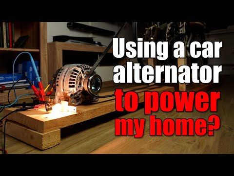 a car alteror sitting on top of a wooden block with the words using a car altertor to power my home?