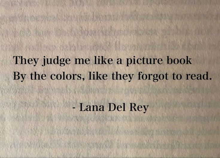 an old book with a quote on it that says they judge me like a picture book by the colors, like they forgot to read