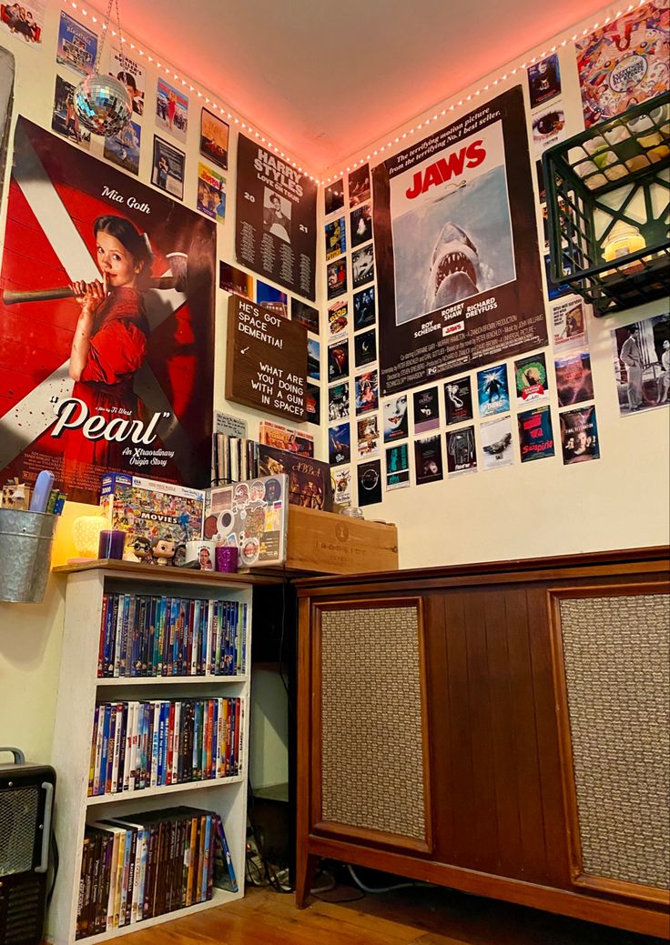 a room with many movies on the wall