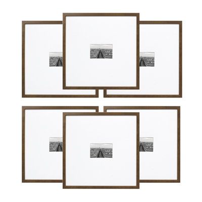 four brown and white frames with pictures on them