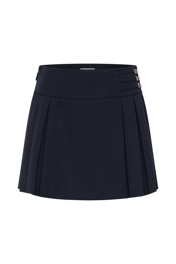 Timelessly tailored.The ANGIE Pleated Buckle Mini Skirt is a playful yet polished addition to your wardrobe, designed to turn heads. This skirt features a wide waistband with a striking buckle detail, adding a touch of sophistication and a flattering fit. The side zip and hook-and-eye closure ensure a seamless silhouette, while the pleated design and mini length create a dynamic, feminine shape. For a chic daytime look, pair it with the Aberley Crop Top, or elevate the ensemble with the Bellamy Elegant Mini Skirt With Belt For Work, Formal Fitted Skirt With Belt Detail, Elegant Fitted Skort With Belt Loops, Elegant Mini Skirt With Belt Detail, Elegant Belted Short Skort, Elegant Formal Mini Skirt With Belt Loops, Elegant Mini Skirt With Belt, Elegant Short Length Belted Skort, Elegant Mini Pleated Skirt With Belt Loops