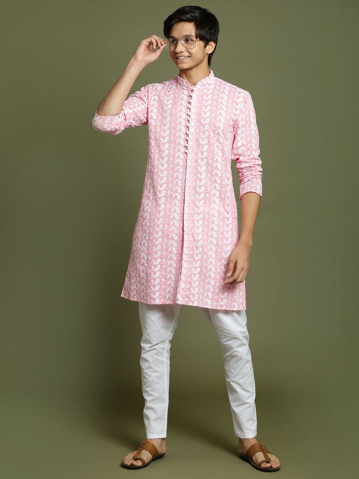 YUVA BY VASTRAMAY Boys' Pink Chaikankari Kurta With White Pyjama Set Get your little one a stylish and comfortable ethnic outfit. This set features a pink cotton kurta with intricate Lucknowi chikankari embroidery all over. The kurta has a mandarin collar, long sleeves, and button closure. It comes with a relaxed fit cotton pyjama in white for a complete look. Key Features Pink cotton kurta with chikankari embroidery Mandarin collar Long sleeves Button closure Relaxed fit cotton pyjama in white Bollywood Style Dabka Sherwani For Spring, Bollywood Dabka Sherwani For Spring, Pink Long Sleeve Traditional Wear With Chikankari Embroidery, Traditional Fit Long Sleeve Kurta With Dabka, Spring Sherwani With Dabka On Straight Kurta, Bollywood Style Cotton Sherwani For Spring, Traditional Pink Tunic Sets, Spring Bollywood Cotton Sherwani, Pink Sherwani With Chikankari Embroidery And Long Sleeves