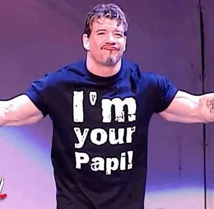 a man with his arms stretched out in front of him, wearing a t - shirt that says i'm your papi