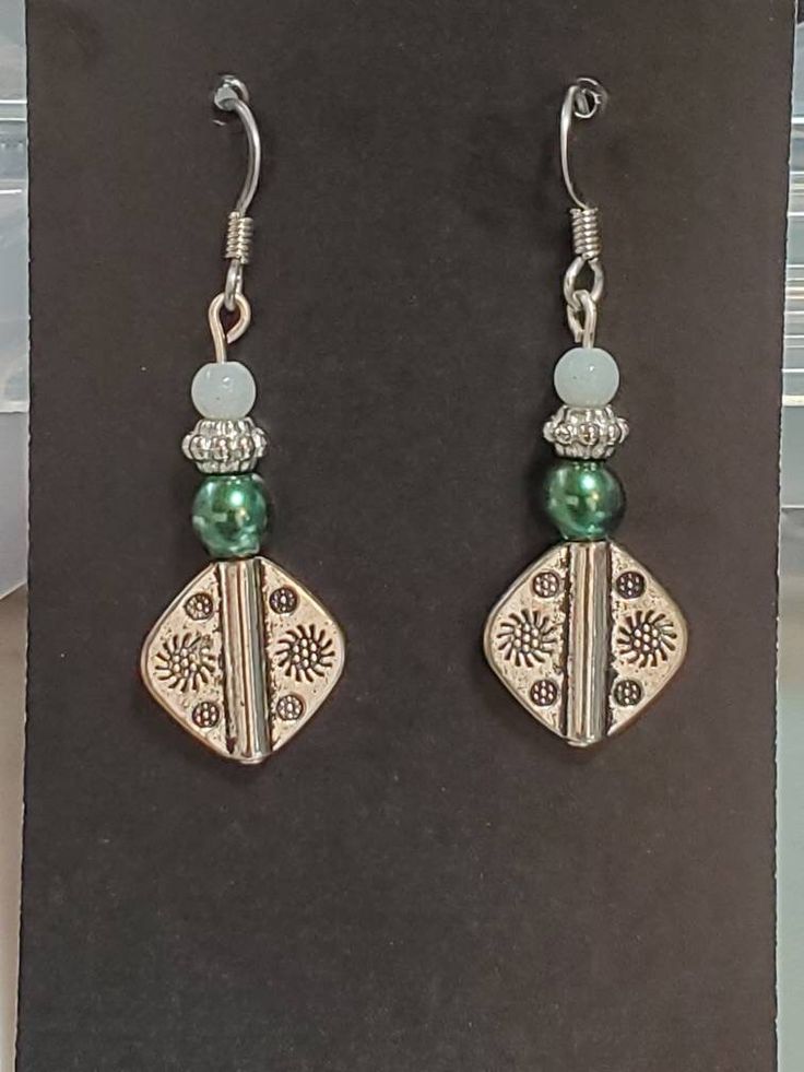 Handcrafted pierced boho style earrings Nickel-free Bohemian Earrings For Beach, Bohemian Nickel-free Earrings For Beach, Bohemian Single Drop Earring, Adjustable Bohemian Dangle Earrings, Bohemian Green Teardrop Earrings With Ear Wire, Adjustable Silver Bohemian Flower Earrings, Nickel-free Bohemian Drop Beaded Earrings, Casual Metal Earrings With Ear Wire, Green Bohemian Hoop Earrings Hypoallergenic