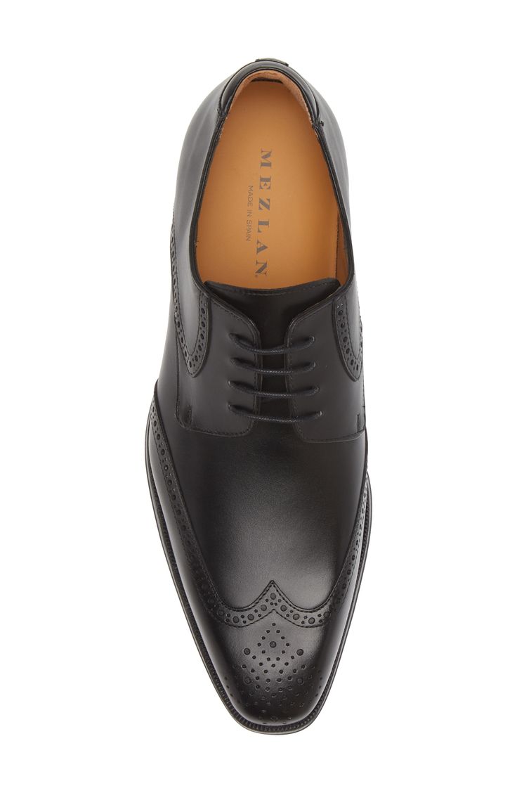 Classic broguing stipples the upper of a burnished-leather derby that adds clean grounding to your sophisticated styles. Lace-up style Cushioned footbed Leather upper and lining/rubber sole Made in Spain Formal Fitted Derby With Brogue Detailing, Formal Cap Toe Lace-up Shoes With Perforated Toe Box, Derby Moc Toe Brogue Dress Shoes, Derby Brogue Dress Shoes With Moc Toe, Formal Oxfords With Perforated Almond Toe Box, Formal Oxfords With Perforated Toe Box, Formal Oxfords With Perforated Almond Toe, Moc Toe Brogue Dress Shoes For Derby, Business Dress Shoes With Perforated Almond Toe