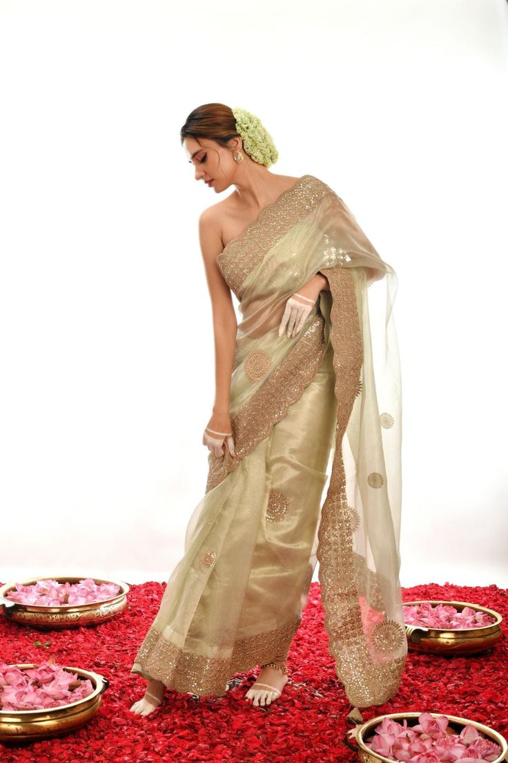 Add a subtle sophistication to your wardrobe with these timeless Sage Green hand-crafted Gotta Patti sarees. Crafted with precision and care, these sarees exude elegance, making them perfect for any occasion. Designer Cotton Silk Pre-draped Saree With Cutdana, Designer Chanderi Pre-draped Saree In Pista Green, Pista Green Cotton Silk Pre-draped Saree, Festive Pre-draped Saree With Sheer Dupatta In Tissue Silk, Navratri Pre-draped Tussar Silk Saree With Sheer Dupatta, Festive Designer Tussar Silk Pre-draped Saree, Designer Cotton Silk Pre-draped Saree With Pallu, Designer Pista Green Pre-draped Cotton Silk Saree, Traditional Pista Green Organza Pre-draped Saree