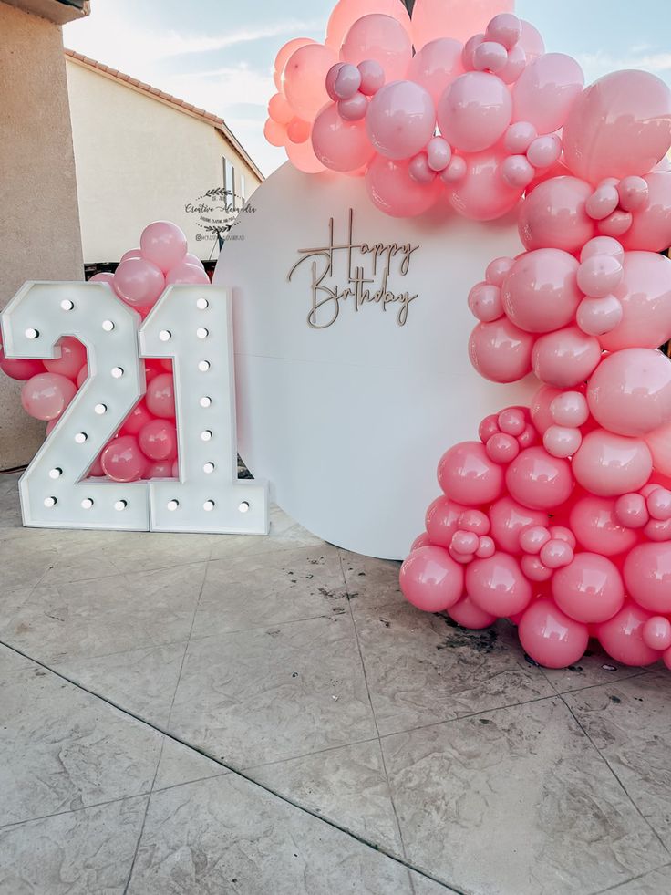 balloons are arranged in the shape of letters and numbers