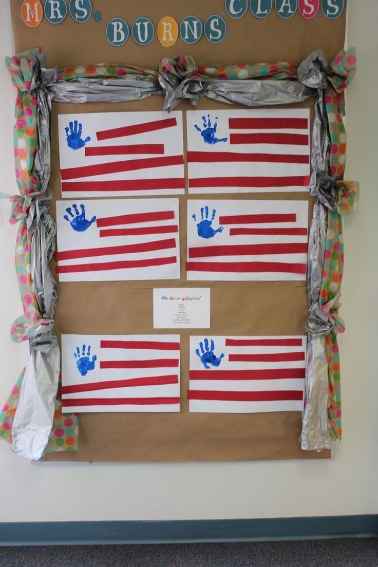 a bulletin board with handprints on it