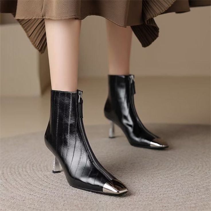 Step up your style game with these elegant high heel boots. Made from genuine cow leather, these ankle boots feature a pointed toe and a 6.5cm heel height for a sophisticated look. The sheepskin insole and pigskin/plush lining provide ultimate comfort, while the zip closure ensures easy wear. Elevate any outfit with these timeless and chic boots. Shop now and step into sophistication with these elegant high heel boots. Elegant Heeled Boots With Metal Feet For Fall, Elegant Winter Boots With Metal Feet, Winter Heels With Metal Feet And Pointed Toe, Elegant Fall Boots With Metal Feet, Formal Pointed Toe Mid-calf Boots For Winter, Winter Ankle Boots With Metal Feet, Evening Heeled Boots With Metal Feet And Pointed Toe, Elegant Heeled Boots With Metal Feet, Chic Snip Toe Heeled Boots For Winter