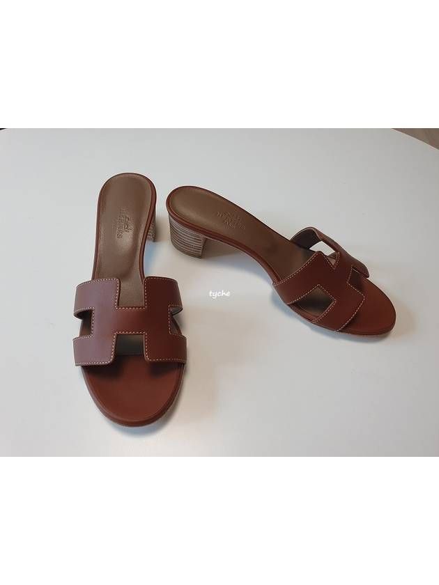 Gender: Women Brand: HERMES Product Name: Oasis sandal gold Oasis sandal Bags Alora Code: 11195120 Origin: France Elegant Sandals With Leather Lining For Vacation, Beach Mules With Leather Lining And Open Heel, Elegant Vacation Mules With Removable Insole, Vacation Sandals With Leather Lining And Open Heel, Leather Lined Open Heel Sandals For Vacation, Elegant T-strap Sandals With Open Heel For Vacation, Luxury Open Toe Sandals For Vacation, Gold Luxury Open Toe T-strap Sandals, Gold Open Toe Luxury T-strap Sandals