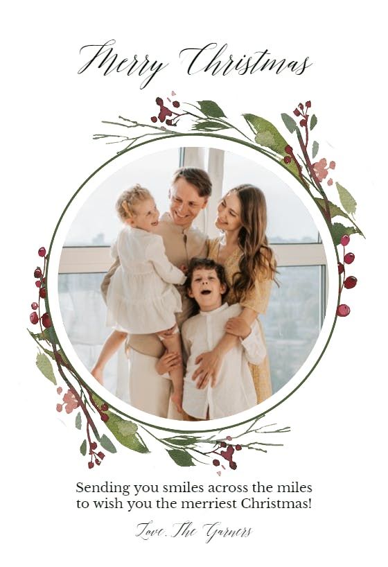 a merry christmas card with an image of three people