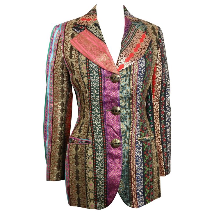 - Vintage 80s Dolce and Gabbana multi colour with jacquard patterns embroidered blazer. This blazer is beautifully done! You can wear it with your jeans with a white t-shirt inside to create a causal look or a knee length dress for evening night out. - Featuring with three gold buttons with colour stones closure. Two welt pockets. - Made in Italy. - Size 4. - 100% Nylon. Eccentric Fashion, Dress For Evening, Quilted Clothing, Embroidered Blazer, Print Ideas, Jacquard Pattern, Dog Print, Dolce & Gabbana, Vintage Jacket