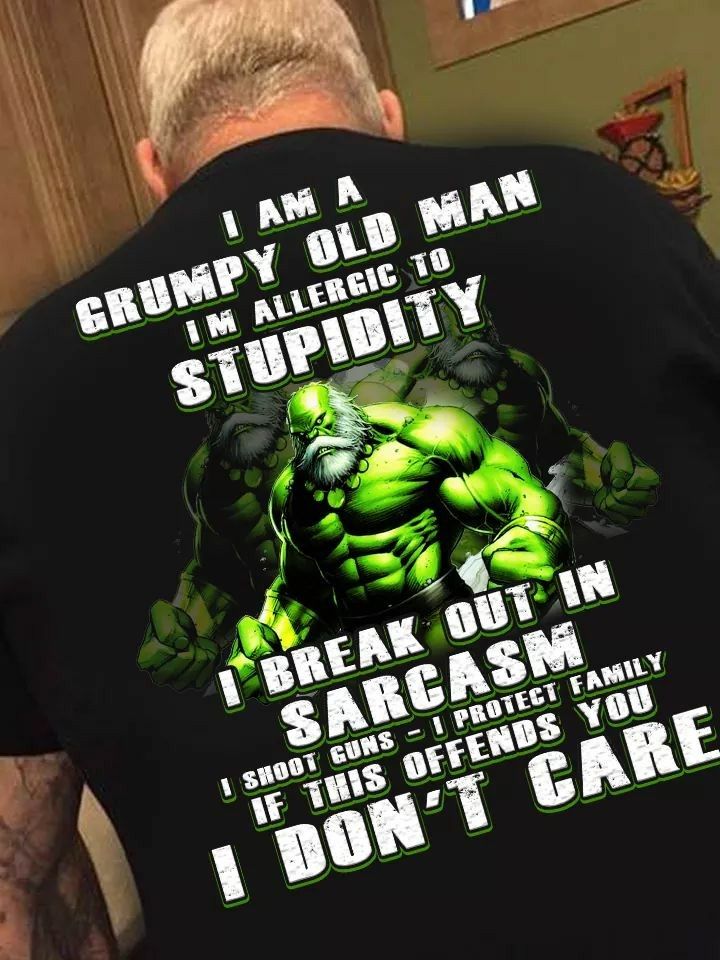 the back of a man's black shirt that says i am a grumpy old man