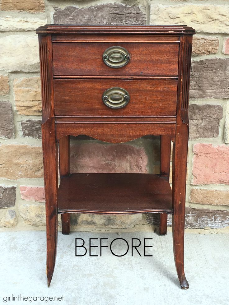 an old nightstand is turned into a side table