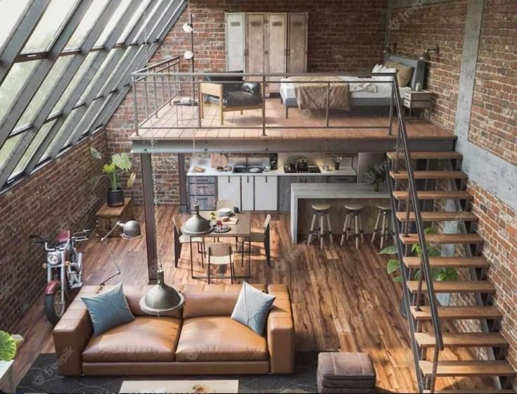 a living room filled with furniture next to a loft type building and wooden flooring