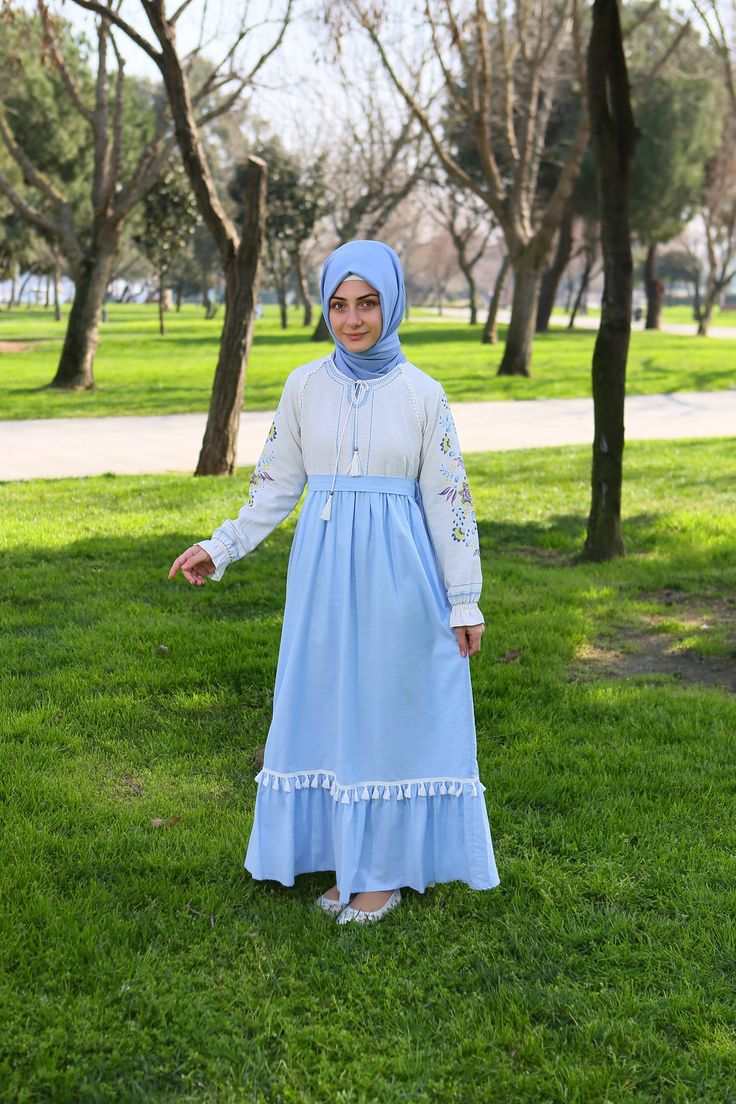 Children's Hijab Dress Vuslat Model Product Features   Fabric Feature: Made of linen (cotton) fabric. It can be used in 4 seasons. Product Features: Children's hijab dress vuslat model is produced with linen cotton fabric. The front and sleeve parts are digitally printed. Top and bottom are combined with different colors. The front part has a drawstring. Belt is available. The upper back has a hidden zipper. The lower part of the skirt has frills and fringe detail. The sleeves are elastic. https Traditional Blue Hijab For Eid, Spring Blue Long Sleeve Abaya, Blue Maxi Length Abaya For Spring, Light Blue Maxi Dress For Eid, Modest Blue Maxi Length Abaya, Modest Blue Dresses For Eid, Girls Eid Dress, Kids Abaya, Kids Clothes Girls