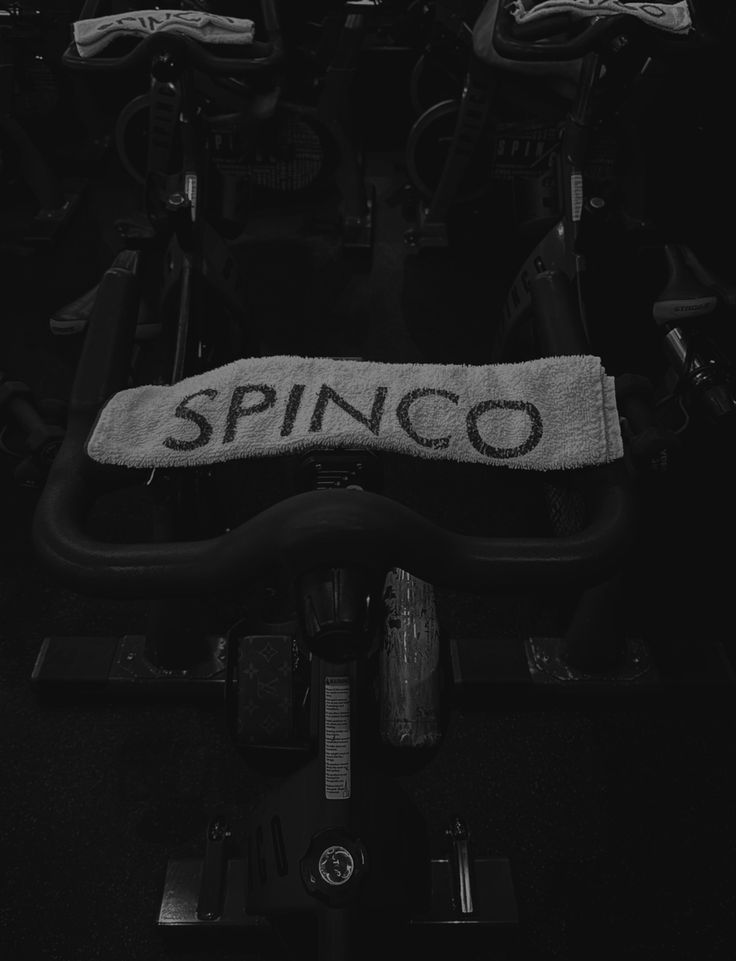 a black and white photo with the word spinco on it's back end