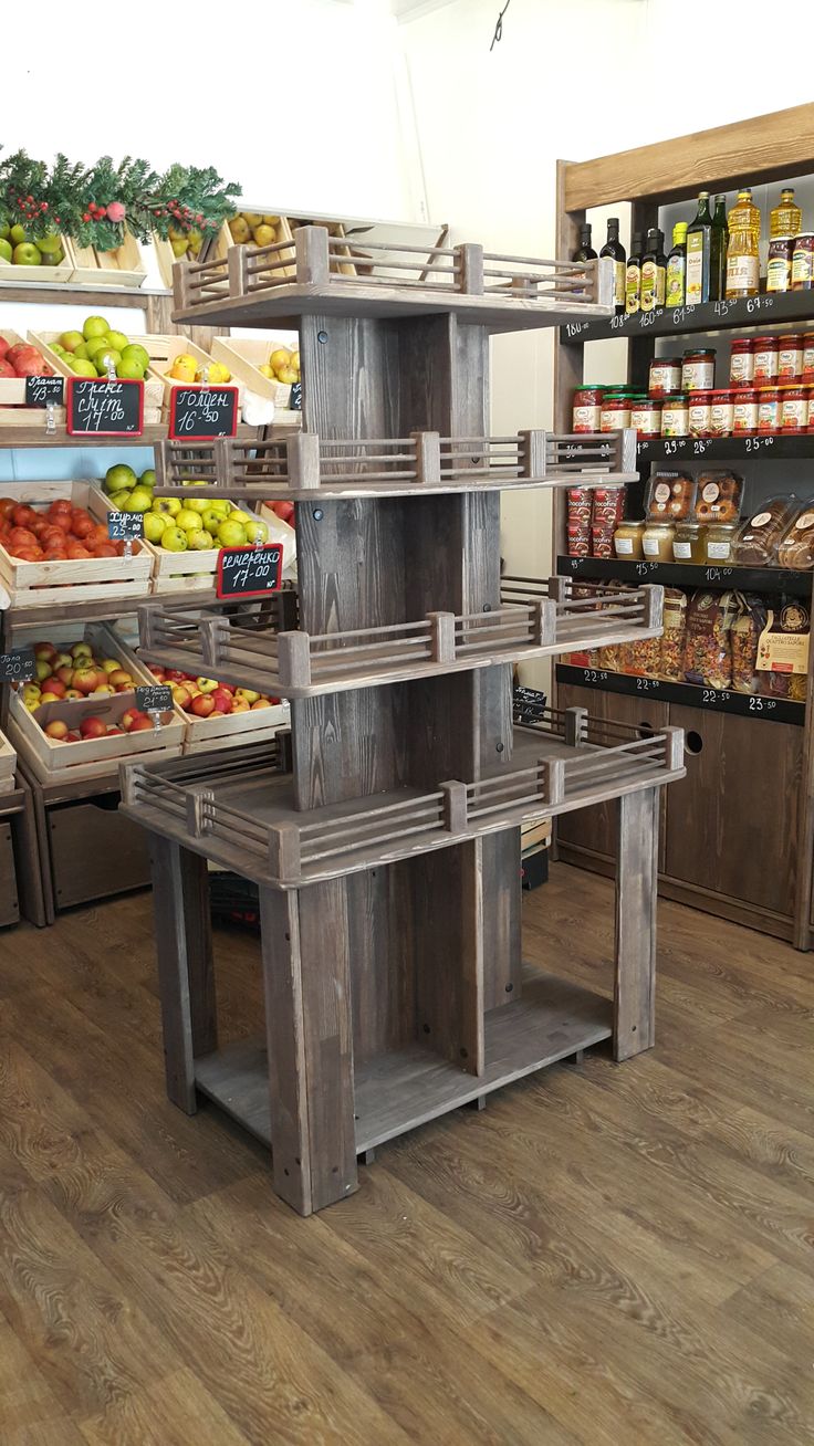 an empty grocery store filled with lots of fresh fruits and veggies on display