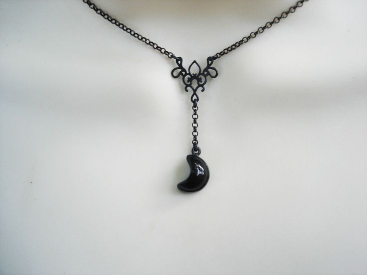 A small crescent moon in black onyx is suspended from a delicate filigree oxidized 925 silver center on oxidized 925 chain in 16 inch or 18 inch lengths.. A small but beautiful necklace for those who love a lightly gothic y drop style. Pick from 16 or 18 inch length chains. Black onyx crescent moon pendant drop is about 1/2 of an inch with the total drop length being about 1 5/8 inches long. A gothically feminine and more delicate necklace. A wonderful gift for the gothic goddess in your world! Ships out by US Postal Service Shipping includes insurance in case of loss of parcel in the mail Necklaces Black, Large Garnet Ring, Oxidised Silver Jewelry, Moonstone Pendant Necklace, Spike Necklace, Crescent Moon Pendant, Crescent Moon Necklace, Oxidised Jewellery, Silver 925 Necklace