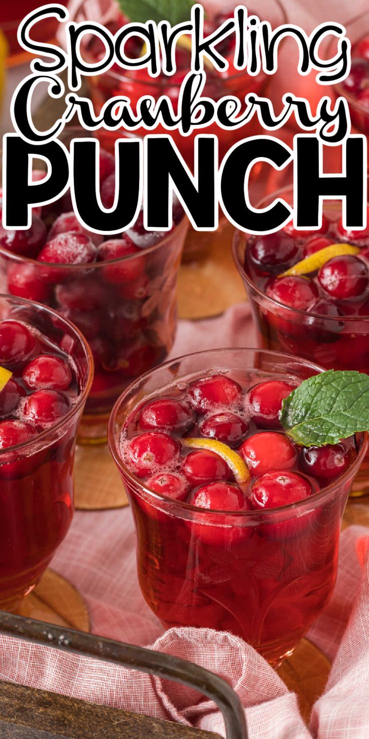 two glasses filled with cranberry punch on top of a table