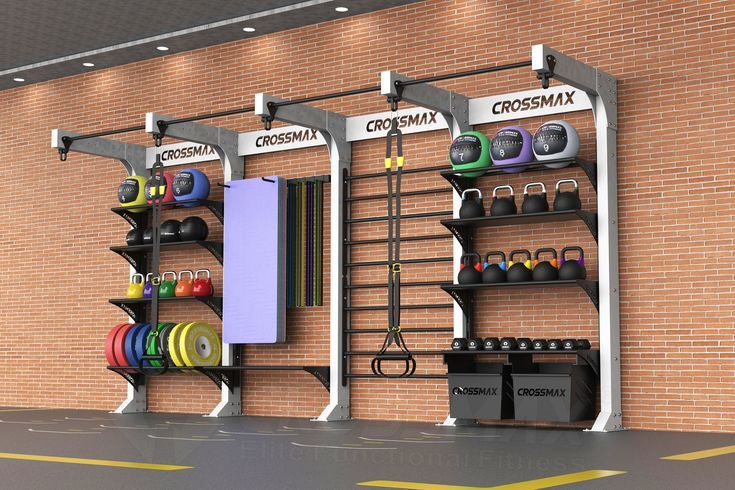 the gym equipment is on display in front of a brick wall