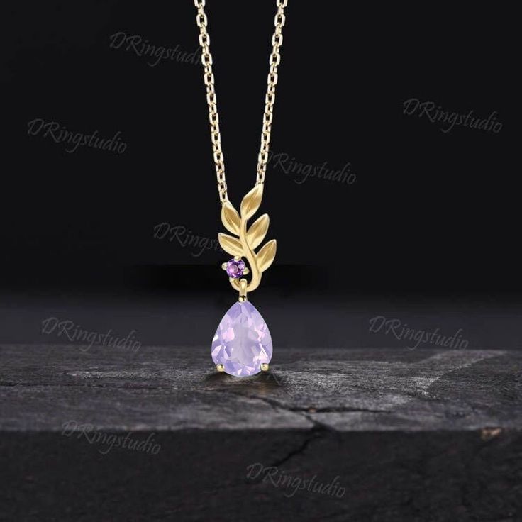 Admire the stunning hues of lavender and violet, each Amethyst necklace exudes charming elegance and offers a gateway to inner calmness, providing a sanctuary from the hustle and bustle of everyday life and keeping the wearer intoxicated. This exquisite Amethyst necklace is believed to bestow fortune, blessings, and wealth, making it an ideal gift for your loved ones, family and friends. INSPIRATION GIFTS CHOICE : The leaf  Lavender Amethyst necklace comes in a delicate jewelry box, it is a good Lavender Fine Jewelry Necklace For Gift, Purple Dainty Necklace For Anniversary, Purple Briolette Necklaces For Wedding, Elegant Lavender Necklaces With Natural Stones, Dainty Purple Necklace For Anniversary, Anniversary Lavender Gemstone Necklace, Purple Teardrop Fine Jewelry Necklace, Elegant Lavender Teardrop Necklace, Lavender Amethyst Necklace With Stones