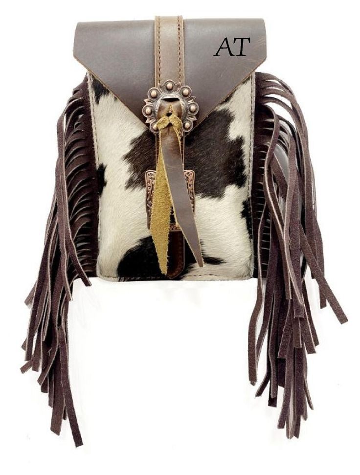 Add a touch of Western chic to your everyday style with this l Hair on Cowhide Saddle Bag. Crafted from real cowhide, each bag boasts unique color tones and patterns, making it truly one-of-a-kind. Ideal for carrying your phone, keys, money, snacks, and more, this saddle bag measures 8.5" x 5", providing just the right amount of space for your essentials. Make it your own by personalizing it with your initials or name. Stand out from the crowd with this distinctive and practical accessory. Rectangular Leather Phone Bag With Snap Closure, Personalized Travel Bag, Saddle Accessories, Western Chic, Flower Girl Gifts, Color Tones, Gifts For Grandparents, Grandparent Gifts, Wedding Item