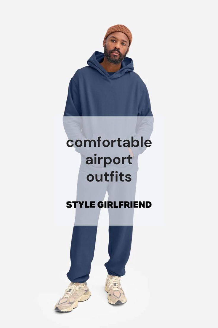 stylish man in a coordinating blue sweatsuit with sneakers and a brown beanie. text on-screen reads: comfortable airport outfits (style girlfriend)