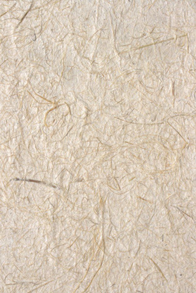 an old paper textured with white paint