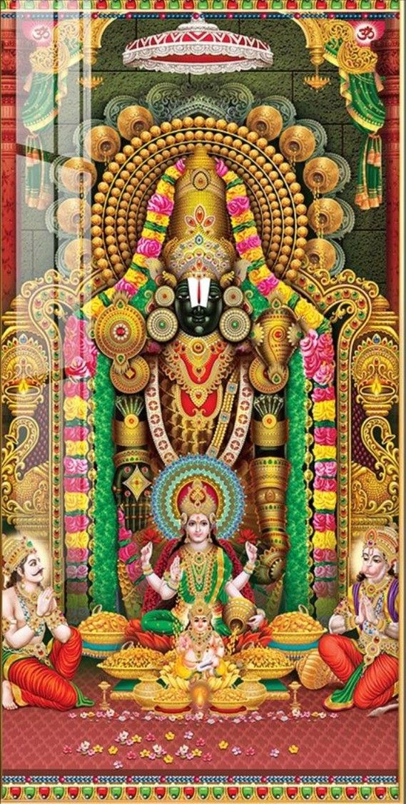 the idol of lord ganesha in front of an ornate wall with gold and green decorations