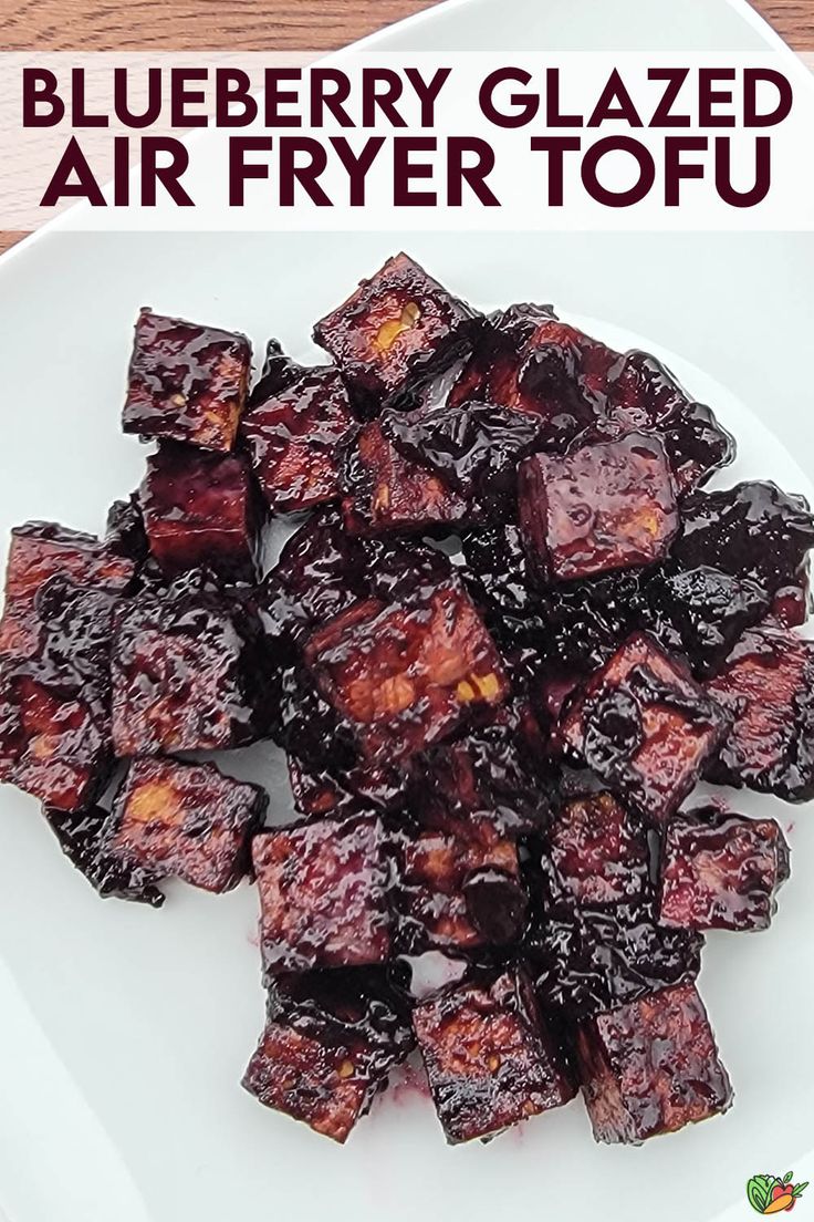 blueberry glazed air fryer tofu on a white plate with text overlay