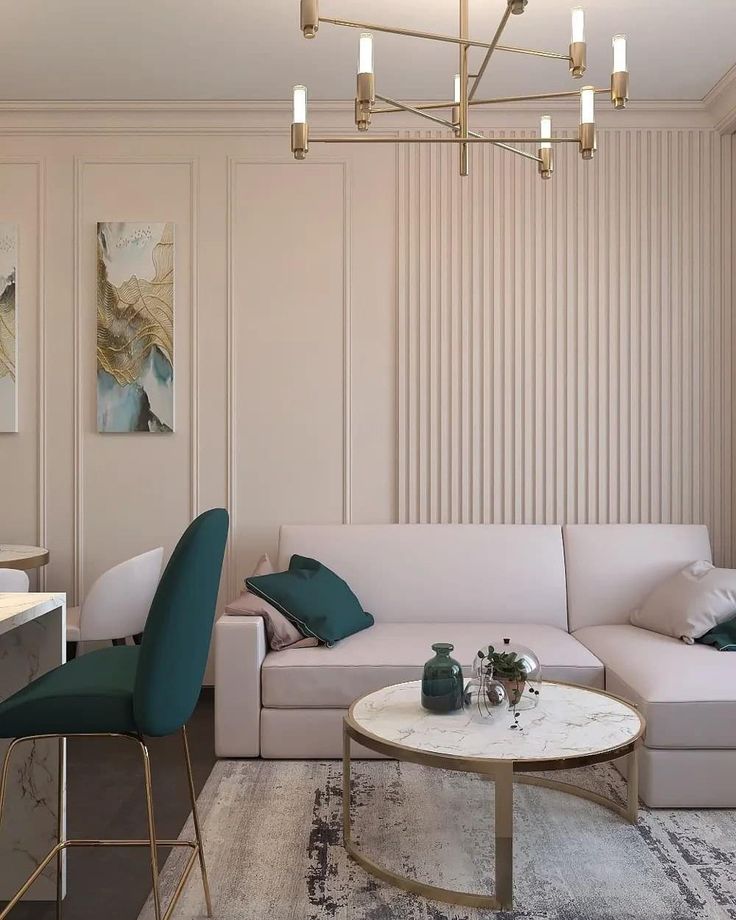 a living room filled with furniture and a chandelier