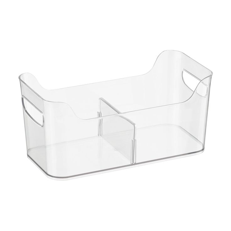 a clear plastic bin with two compartments on the bottom and one section open to show it's contents