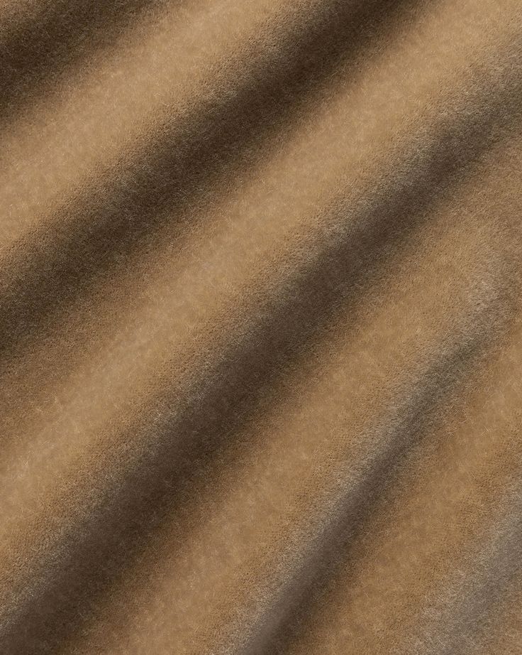 an image of a brown fabric textured with some sort of cloth or material that is very soft