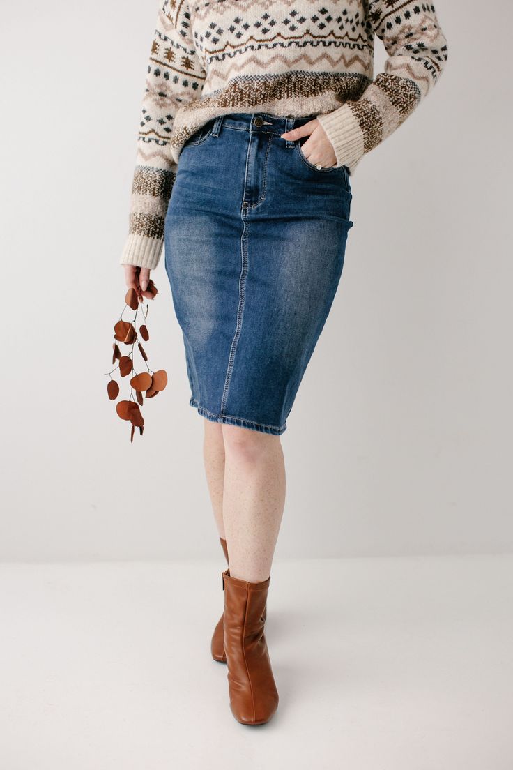 Every modest denim collection needs a classic no-fuss dark wash denim skirt! The 'Scout' denim skirt features a simple design, a modest knee-length, and working pockets for life on the go! The knit denim with belt loops ensures a flattering fit for a variety of body types. Style with a graphic tee and sneakers for an effortless vibe. Perfect for your everyday activities or traveling the world! Exclusively designed by us, for you! 85% Cotton 10% Polyester 5% Spandex Wash Cold Gentle Cycle Hang to Classic Medium Wash Mid-rise Denim Skirt, Classic Mid-rise Medium Wash Denim Skirt, Medium Wash Knee-length Denim Skirt For Fall, Fall Denim Knee-length Skirt, Medium Wash Knee-length Skirt For Fall, Knee-length Medium Wash Skirt For Fall, Fall Knee-length Denim Skirt, Dark Wash Knee-length Denim Skirt, Medium Wash Denim Pencil Skirt With Pockets