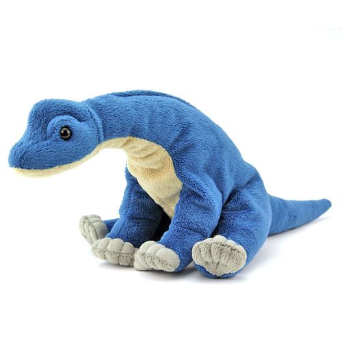 a blue stuffed dinosaur sitting on the ground