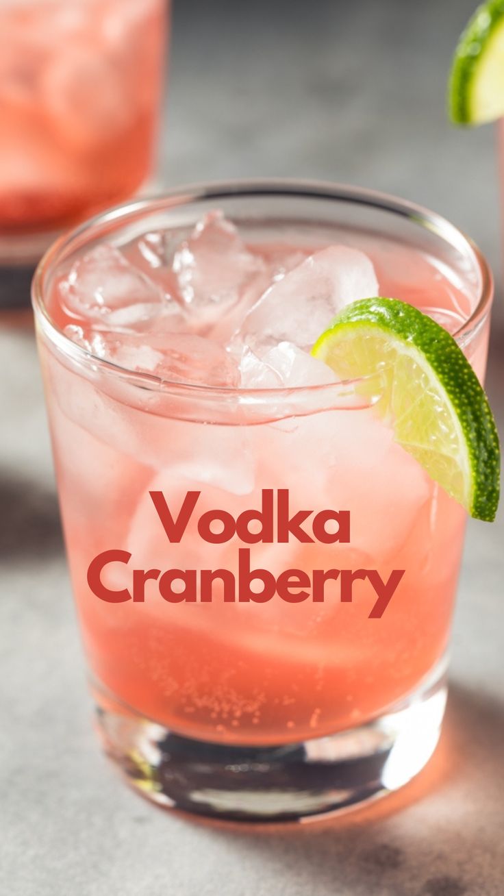 the vodka cranberry cocktail is garnished with lime