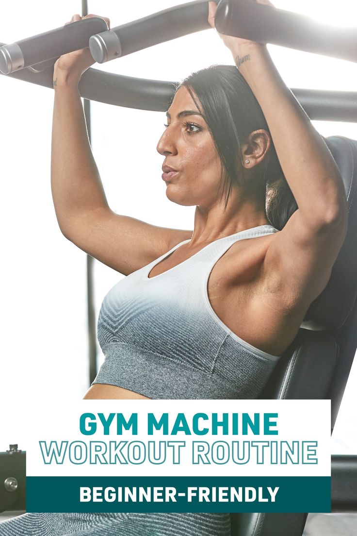 a woman working out with a gym machine