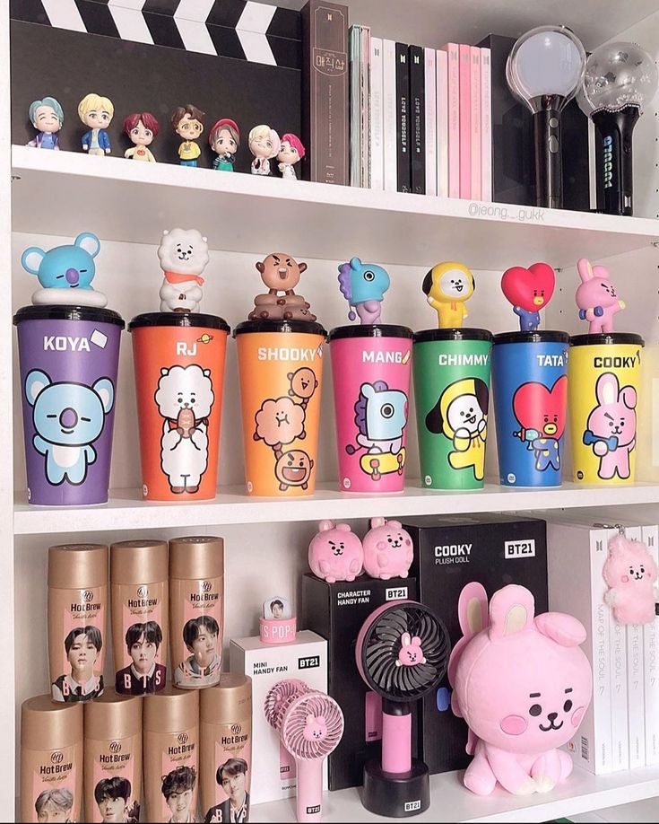 the shelves are filled with many different colored items and teddy bear figurines on them