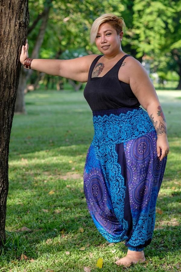 Bring a breezy feel to your day with our beautiful, handmade blossom pants now available in oversize. Its bright colors and distinctive patterns will bring you a touch of Thai magic to your plus size wardrobe. It's the perfect match of style and comfort.    Made of bamboo rayon, a super breathable and light fabric, these pants will guarantee comfort to all you curvy ladies out there. You can even wear them as a jumpsuit if you prefer - 2 pants in 1!      Brand: Handmade 
Material: Bam Plus Size Wardrobe, Plus Size Harem Pants, Curvy Boho, Purple Blossom, Plus Size Hippie, Plus Size Bohemian, Boho Plus Size, Hippie Clothes, Hippie Pants