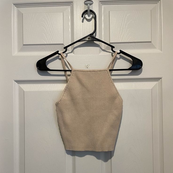 Brand New With Tags. High Neck And Lower In The Back. Open To Offers. Beige Stretch Knit Crop Top, Beige Fitted Crop Top Knit, Fitted Knit Crop Top In Beige, Fitted Beige Knit Crop Top, Fitted Knit Beige Crop Top, Beige Ribbed Knit Crop Top, Trendy Cropped Beige Knit Top, Beige Knit Crop Top, Trendy Beige Cropped Knit Top