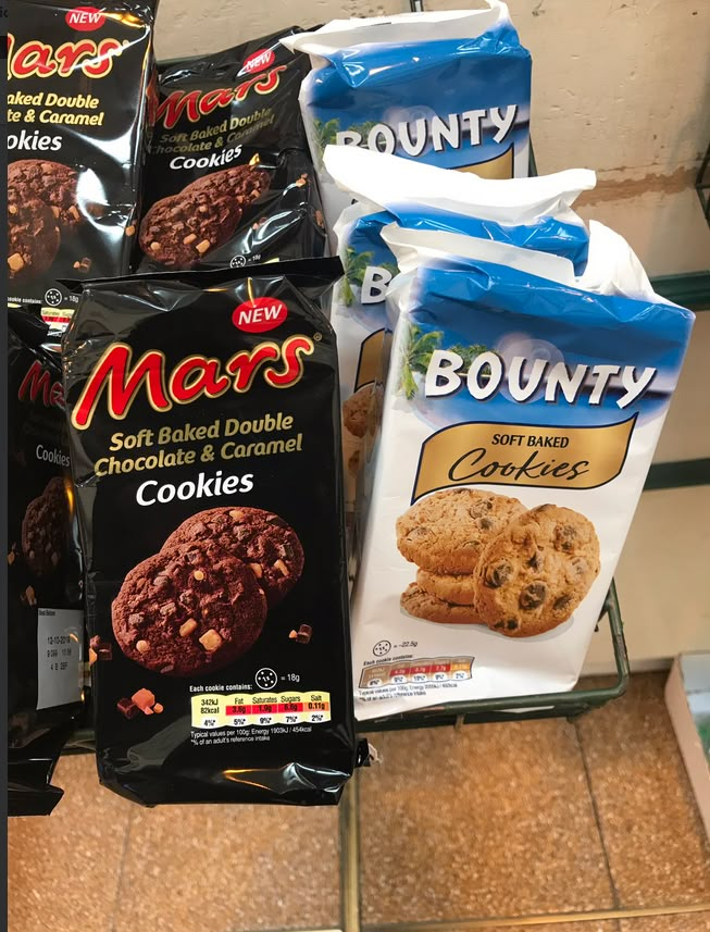 bags of cookies are sitting on the counter