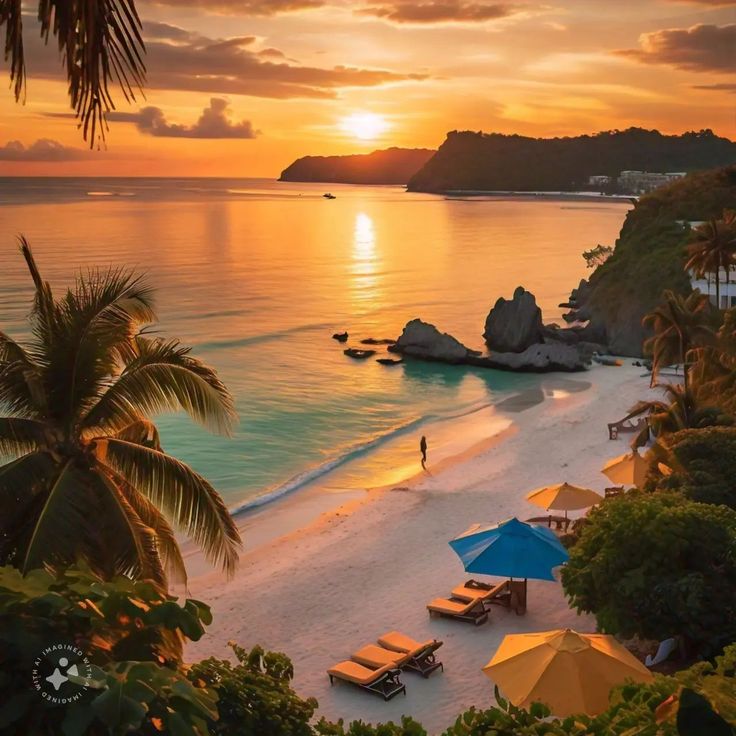 the sun is setting over an ocean beach with lounge chairs and umbrellas in the foreground