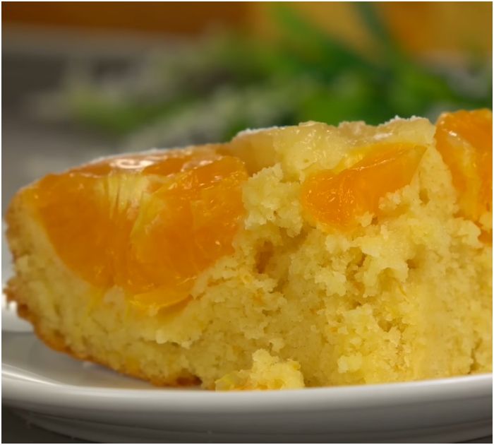 a piece of orange cake on a plate